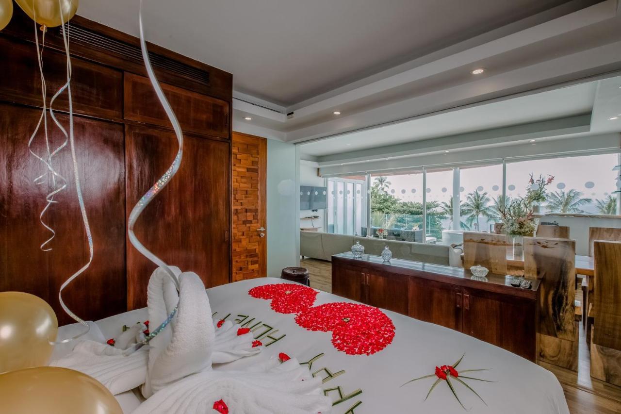 The Privilege Hotel Ezra Beach Club Praia de Bang Rak Exterior foto